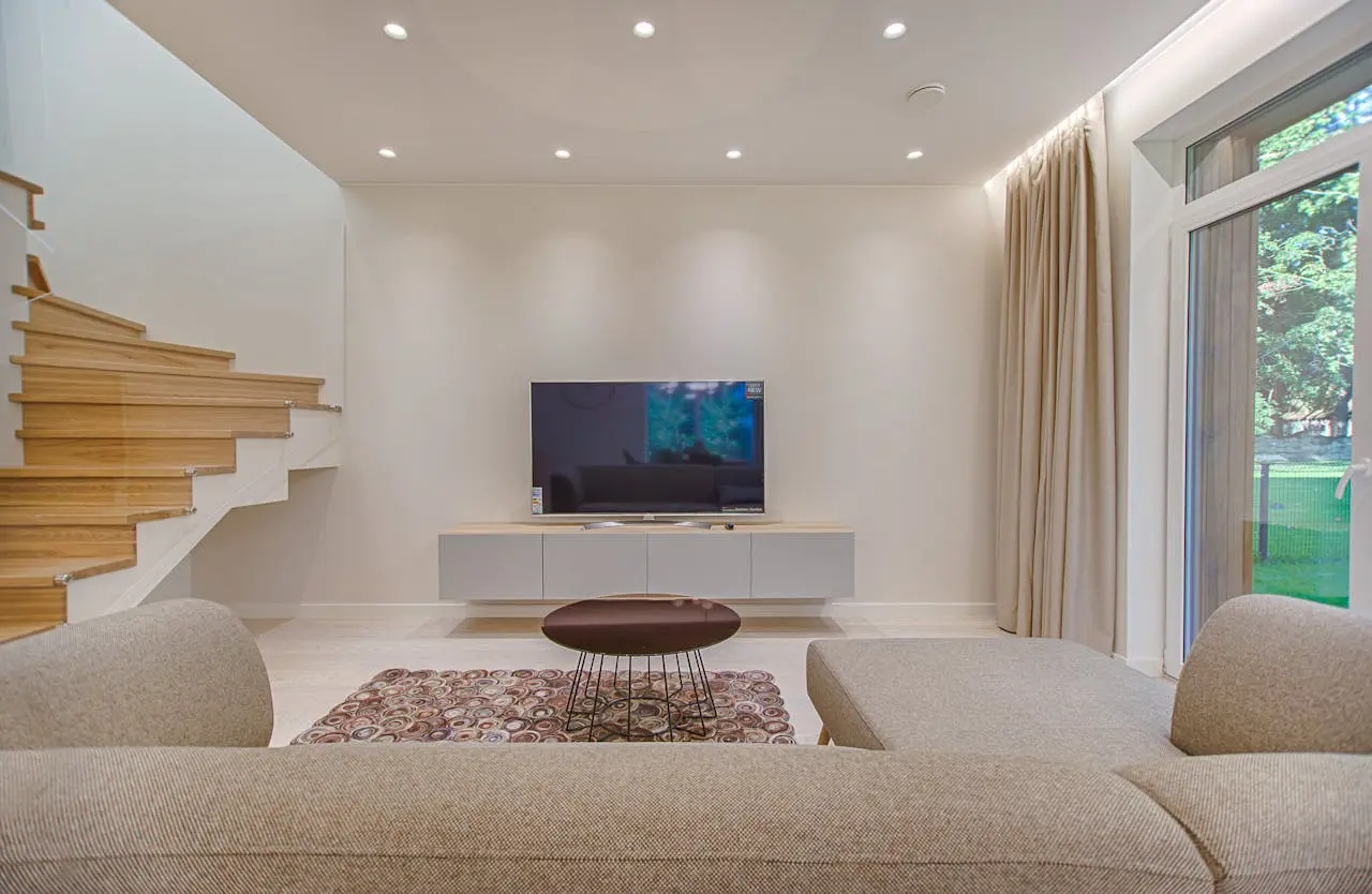 A living room with a tv and couch